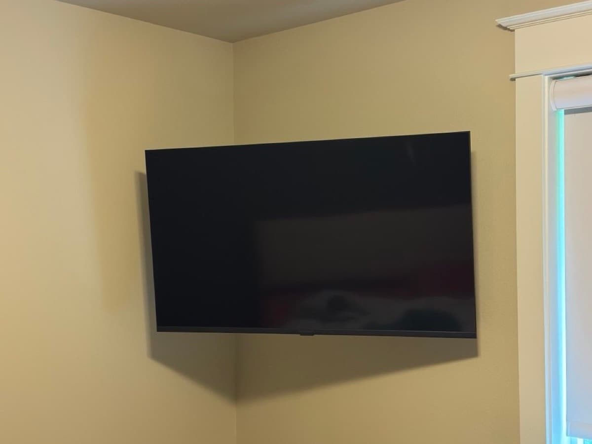 TV mounted in corner of room Portland OR — EVN Handyman