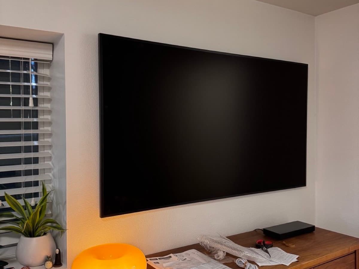 Large TV wall-mounted above dresser Portland — EVN Handyman